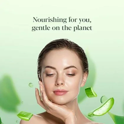 Close-up of a hand applying aloe moisturizer to smooth skin