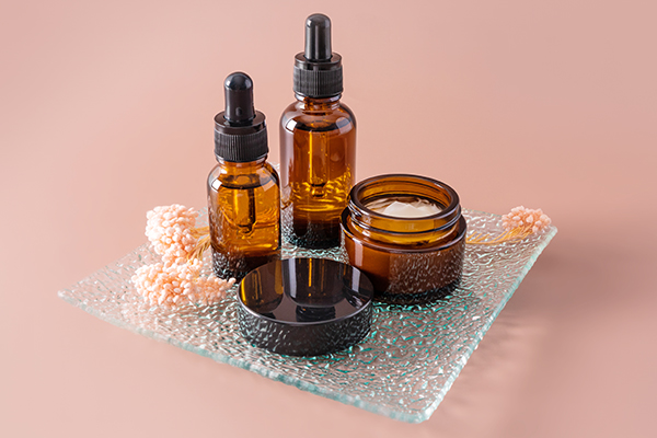 Various serum bottles arranged neatly, showcasing different types and formulations for skincare.